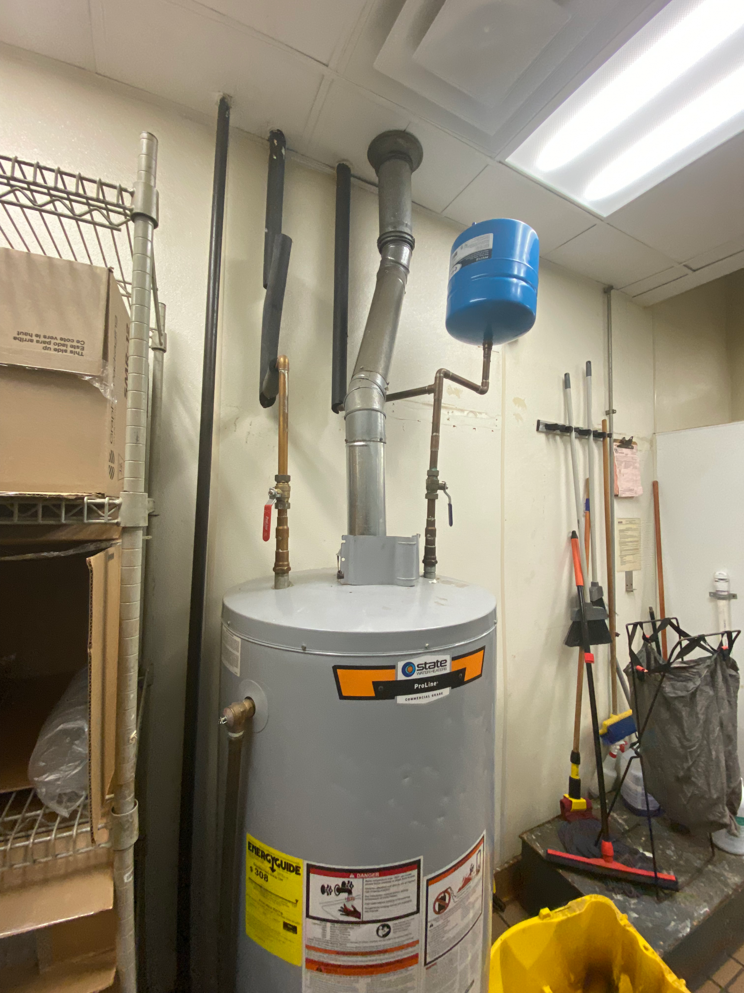 Old 75-gallon State ProLine tank water heater before replacement at Gaithersburg restaurant - Mallick Plumbing & Heating